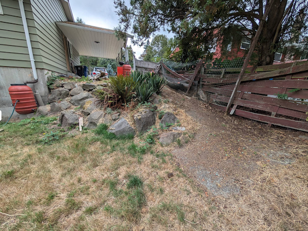 Seattle retaining wall before image.
