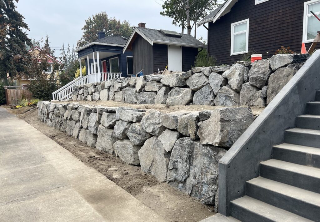 2 Tiered rockery wall in Seattle, WA front yard.