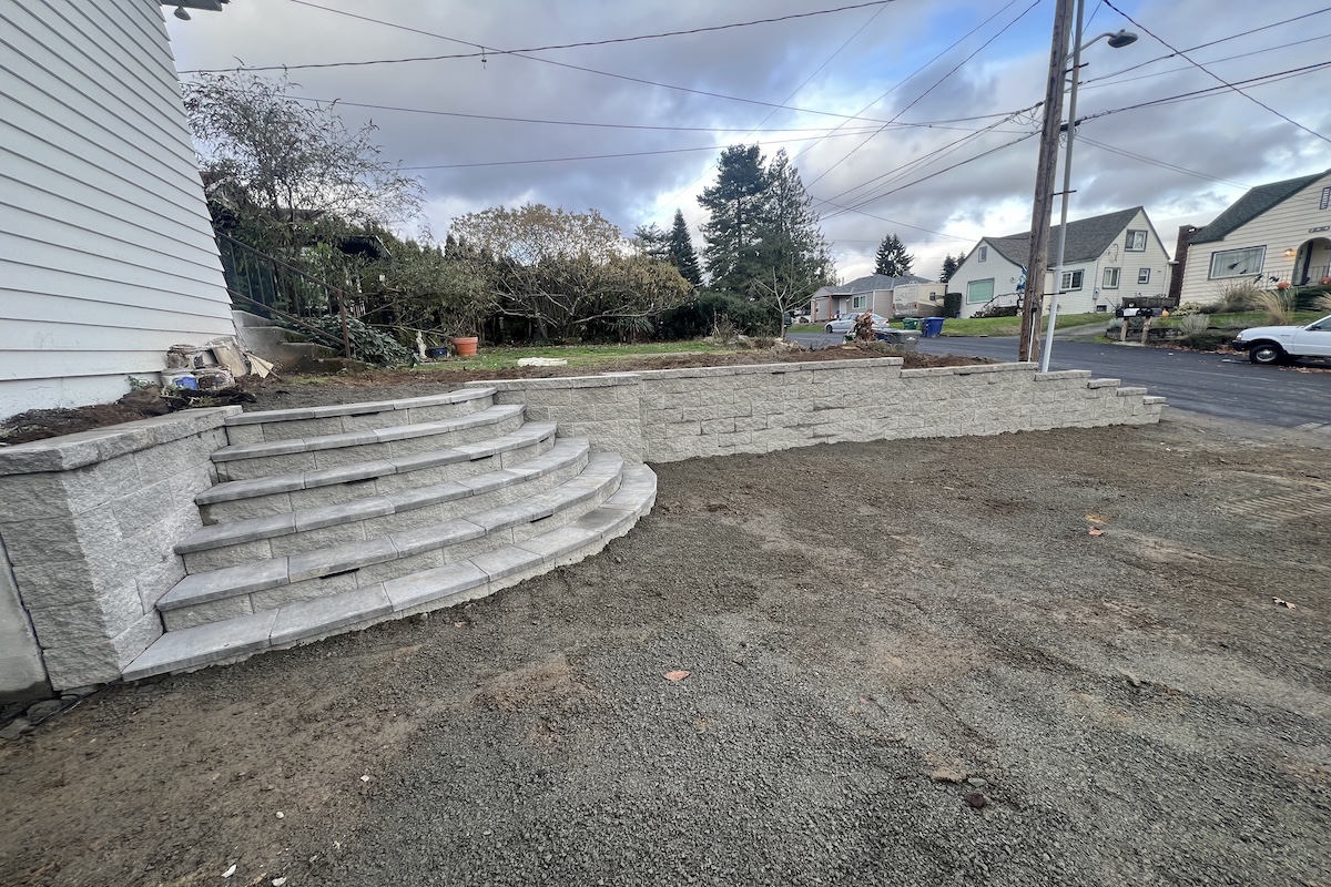 Renton block wall with curved steps.